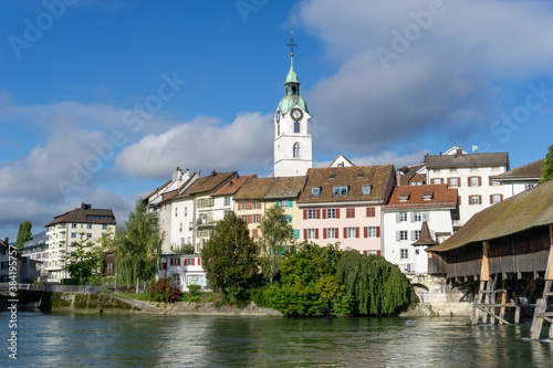 view of the Aare river and the historic old town of Olten and wooden bridge