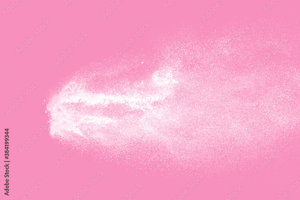 White powder explosion on pink background. Paint Holi. White powder explosion on pink background. Paint Holi.