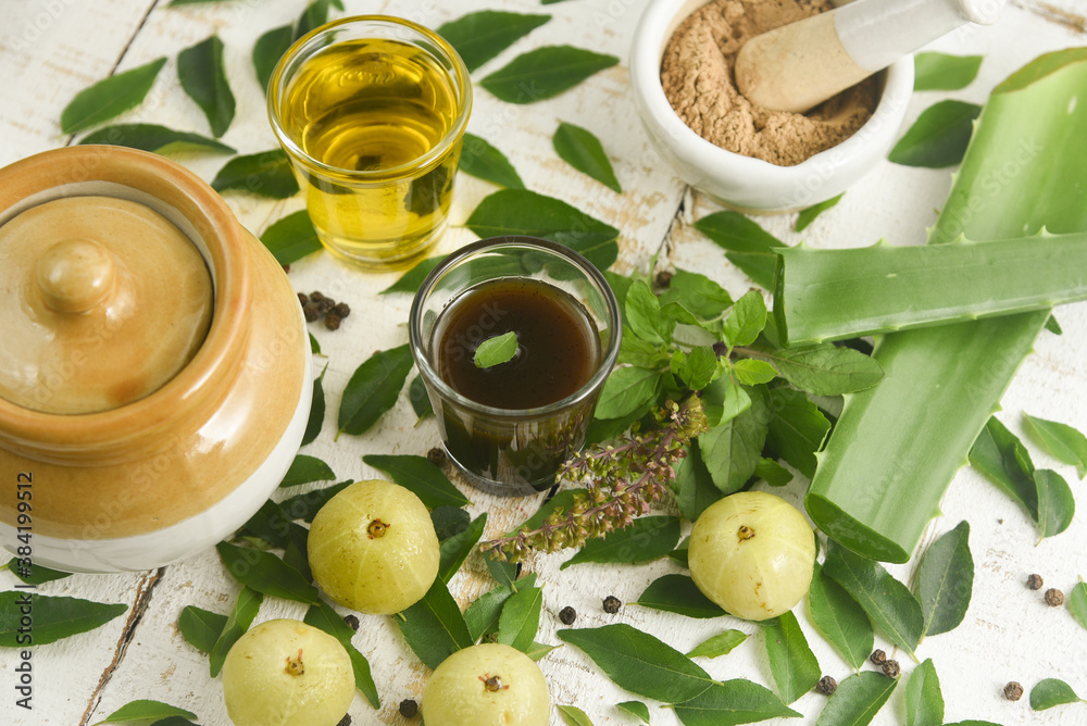 Ayurvedic Oil or Herbal Hair Oil with Herbs tulsi, curry leaves, oil