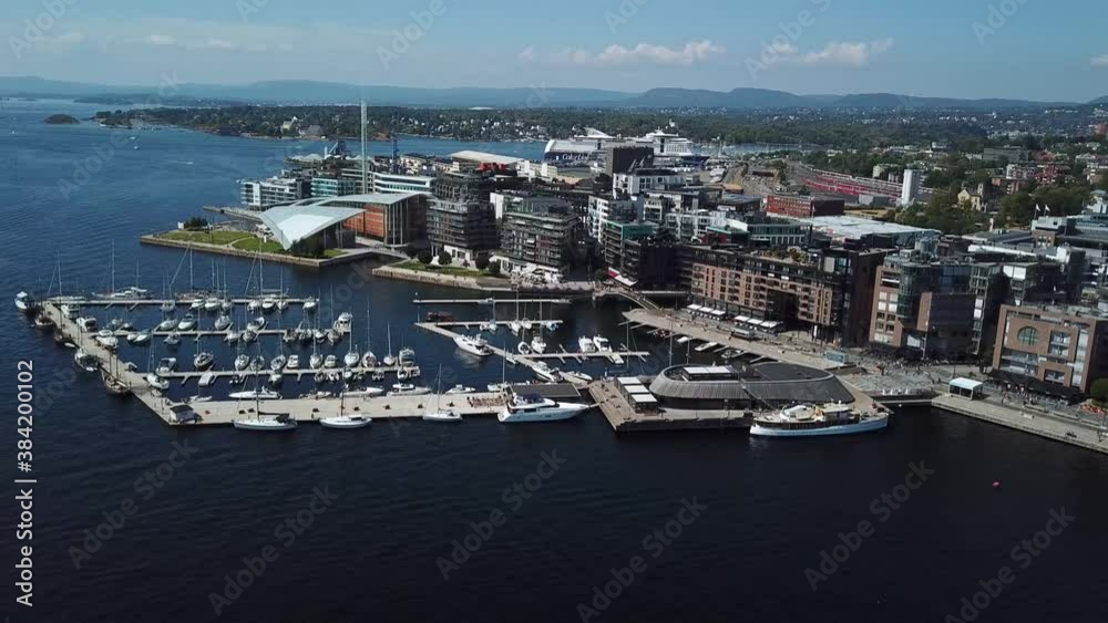 Oslo, Norway, Yacht and sailboats moored at the quay. 4k Aerial view. Top view harbor Oslo, Norway, Yacht and sailboats moored at the quay. 4k Aerial view. Top view harbor