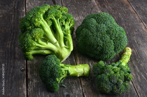 Group of Broccoli heads on a wooden background