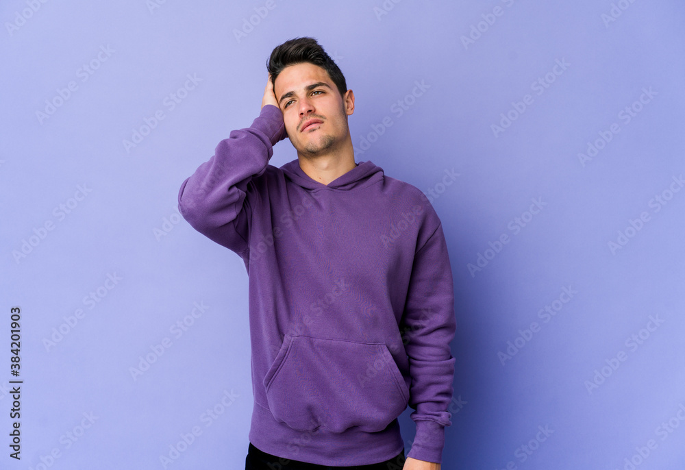 Young caucasian man isolated on purple background tired and very sleepy keeping hand on head. Young caucasian man isolated on purple background tired and very sleepy keeping hand on head.