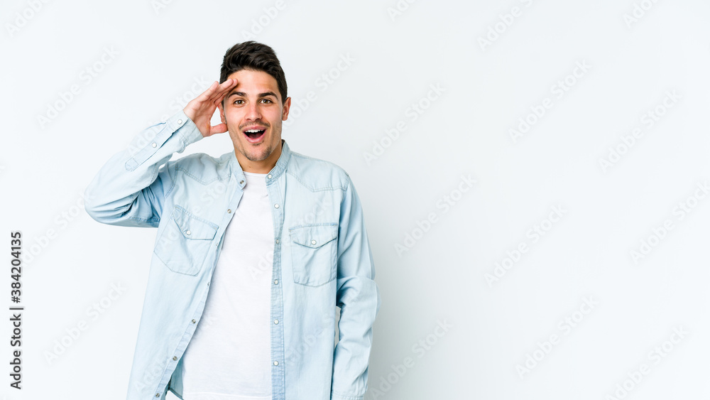 Young caucasian man isolated on white background shouts loud, keeps eyes opened and hands tense. Young caucasian man isolated on white background shouts loud, keeps eyes opened and hands tense.