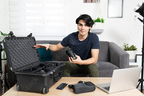 Photographer showing interior of his bag photo