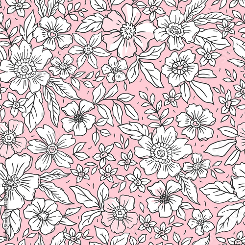 Vintage floral background. Seamless vector pattern for design and fashion prints. Flowers pattern with small white flowers on a light pink background. Ditsy style.