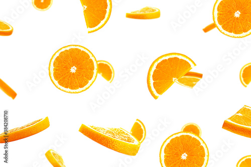 Orange slices on white background. Macro. Flying orange. High quality photo