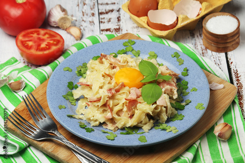 A plate with traditional pasta carbonara 