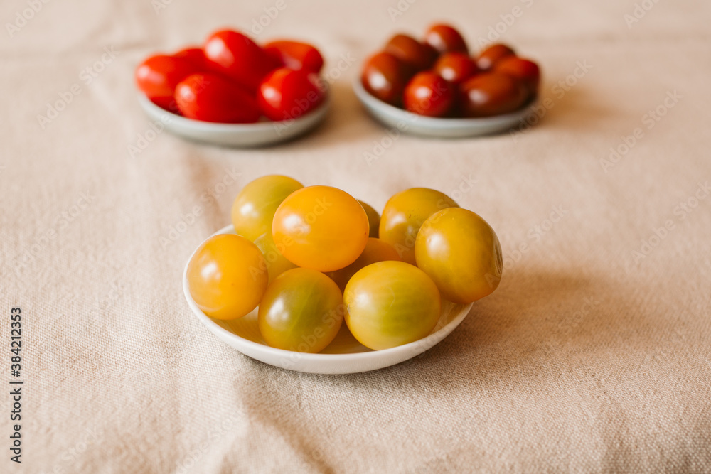 Different kind of organic tomatoes in a bowl. Different kind of organic tomatoes in a bowl.