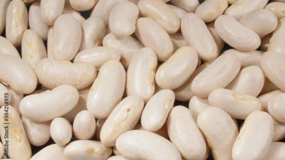 White beans close up. Macro. 4K video. Organic legumes. White beans close up. Macro. 4K video. Organic legumes.
