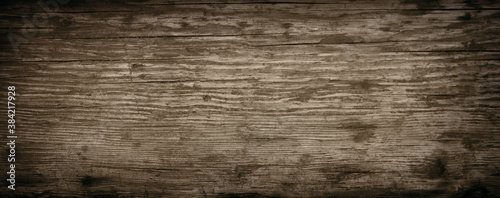 Black rustic wooden texture. Natural dark black rustic wooden texture. Horizontal vintage background for retro concepts with space for text