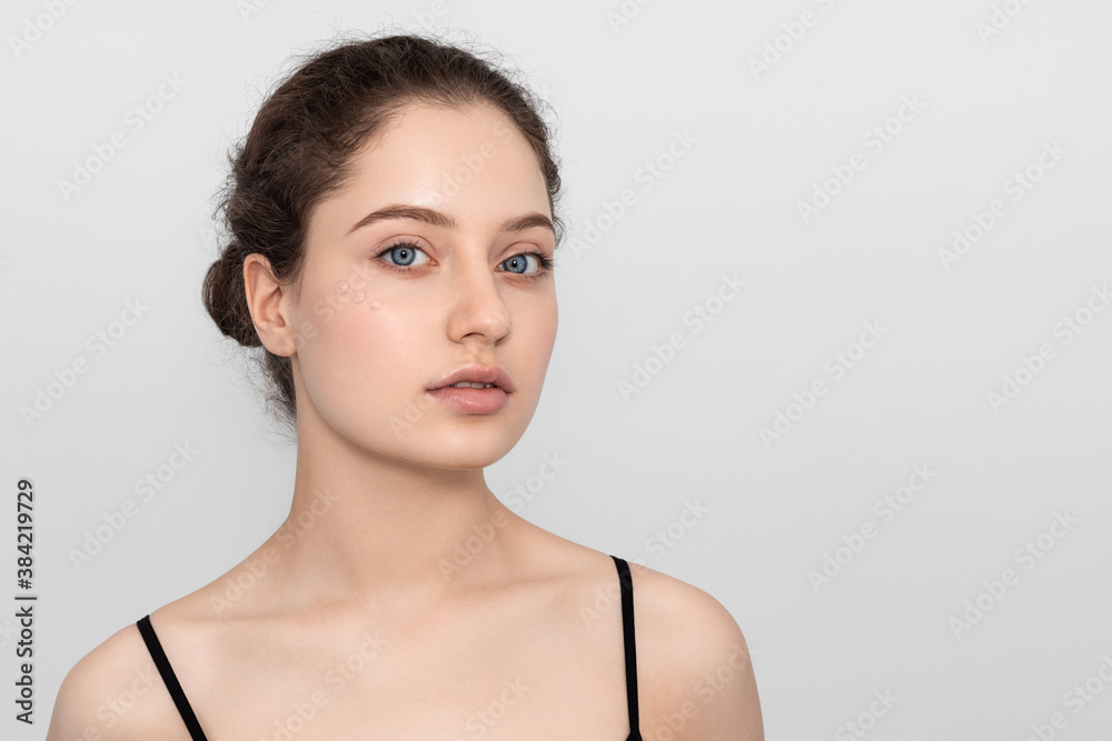 Young woman with a tone cream Young woman with a tone cream