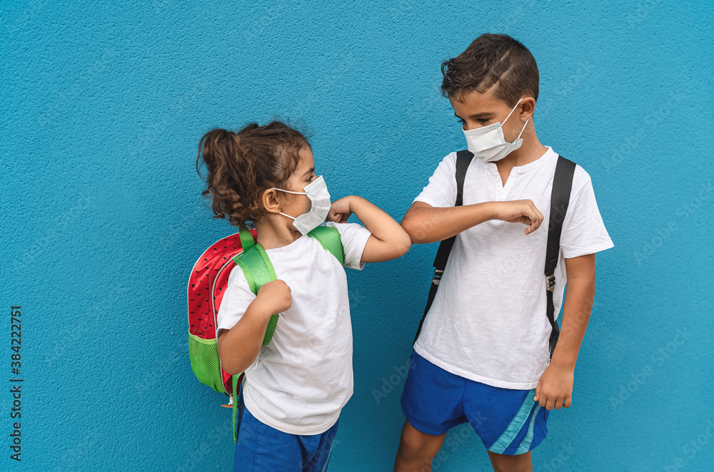 Children wearing face protective mask going back to school during