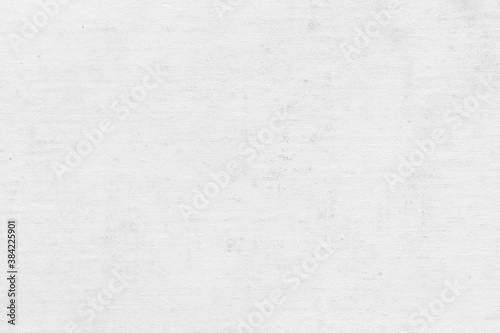 White natural linen texture as a backdrop. Abstract cotton towel mockup template fabric on the background. Cloth wallpaper of artistic grey wale linen canvas texture for the painting. 