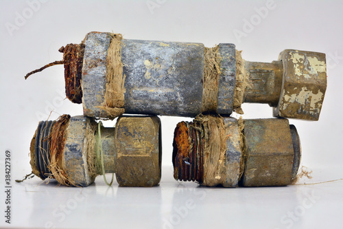 Brass and lead accessories with rust and limestone