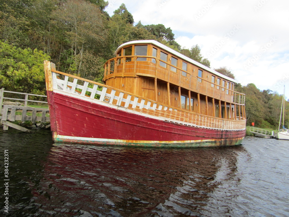 Scotland Scenery with Boat on Loch Ness Scotland Scenery with Boat on Loch Ness