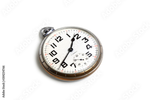 Antique pocket watch isolated on a white background