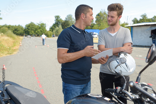 young man training at motorcycle trainging course © auremar