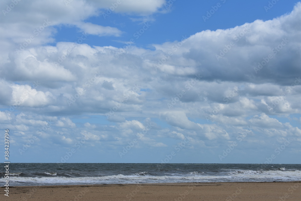 beach with clouds
