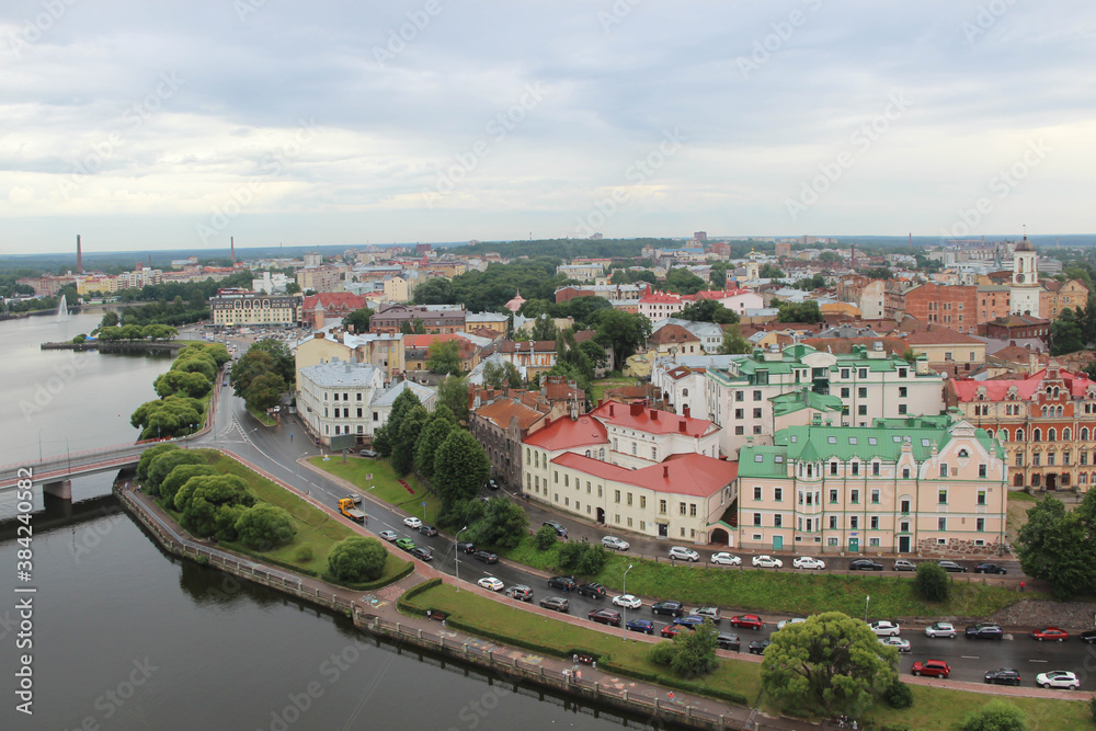 Top view of the beautiful old town, water and cozy colored houses, Russia, Vyborg. 