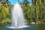 Fountain on the lake in the landscape park Mezhigirya near Kiev, Ukraine.