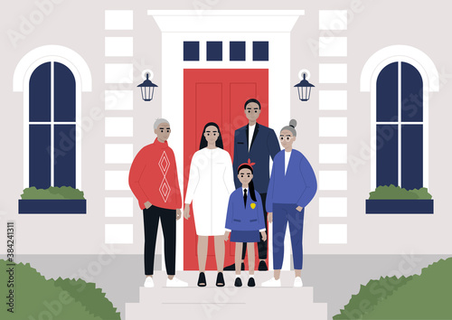 A multi-generational caucasian family standing in front of the building, real estate property