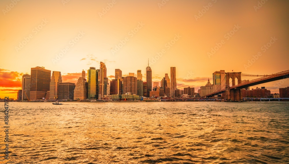city skyline at sunset New York beautiful colors orange buildings 