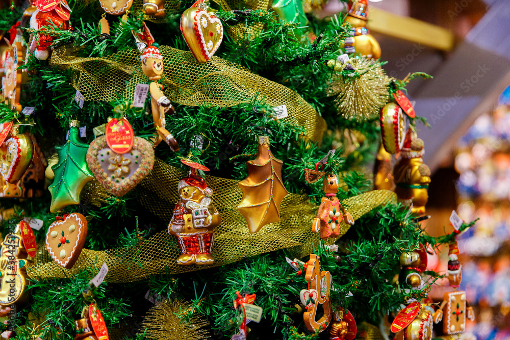 Fototapeta premium Bruges, Flanders, Belgium, Europe - October 1, 2019. Close-up of a Christmas tree decorated with Christmas toys in Brugge)