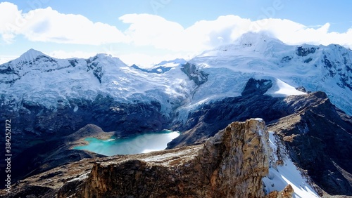 Desde la cima del Urus viendo la laguna Aquilp con el Tocllaraju al fondo  photo