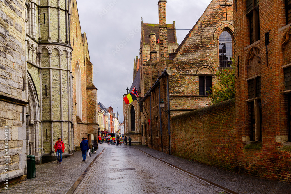 Bruges, Flanders, Belgium, Europe - October 1, 2019. Medieval old brick houses on the ancient streets in  Bruges (Brugge) in autumn
