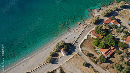 Aerial drone photo of beautiful seaside village and turquoise beach of Porto Germeno, Corinthian gulf, West Attica, Greece photo