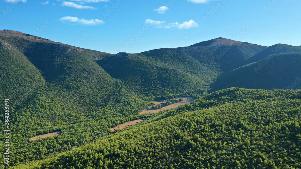 Fototapeta premium Aerial drone photo of beautiful mountainous landscape in West Attica next to famous mountain of Pateras, Greece
