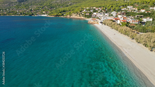 Aerial drone photo of beautiful seaside village and turquoise beach of Porto Germeno, Corinthian gulf, West Attica, Greece