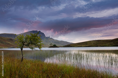 Sunrise colours at Loch Fada on the Isle of Skye with the Old man of Storr in the Background