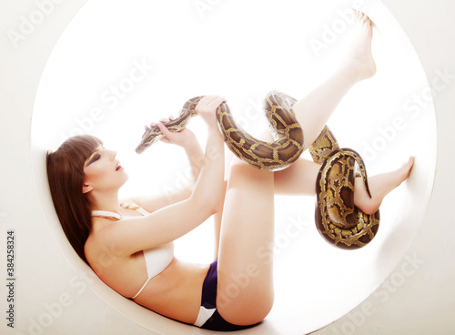brunette woman with python