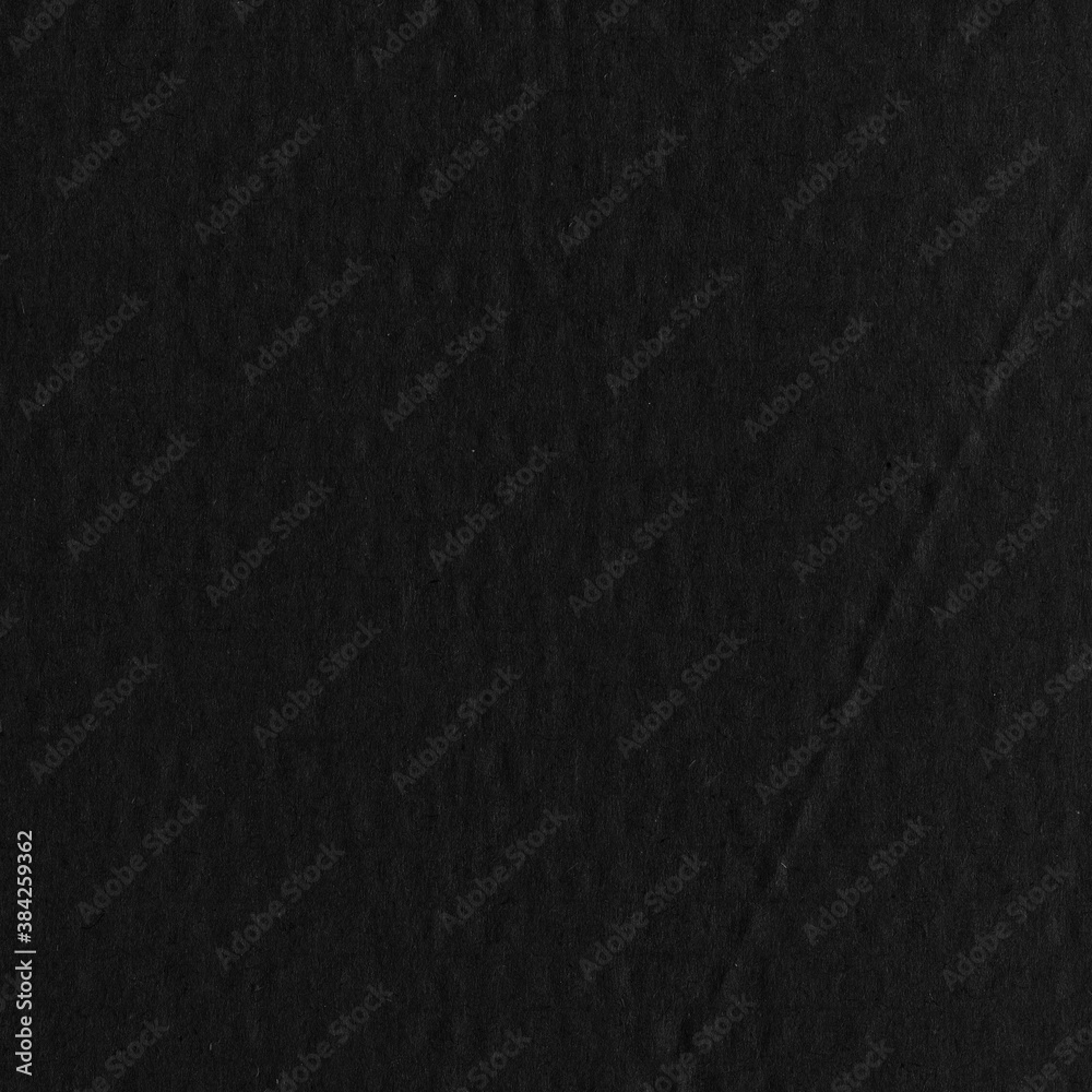A black vintage rough sheet of carton. Recycled environmentally ...