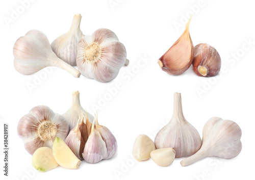 Set with garlic bulbs and cloves on white background