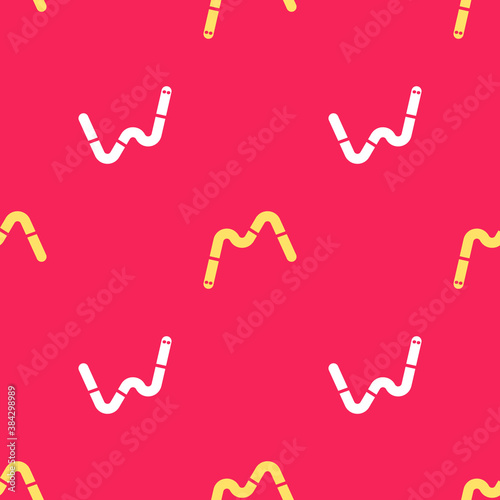 Yellow Jelly worms candy icon isolated seamless pattern on red background. Vector.