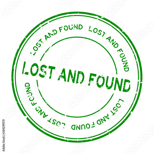 Grunge green lost and found word round rubber seal stamp on white background