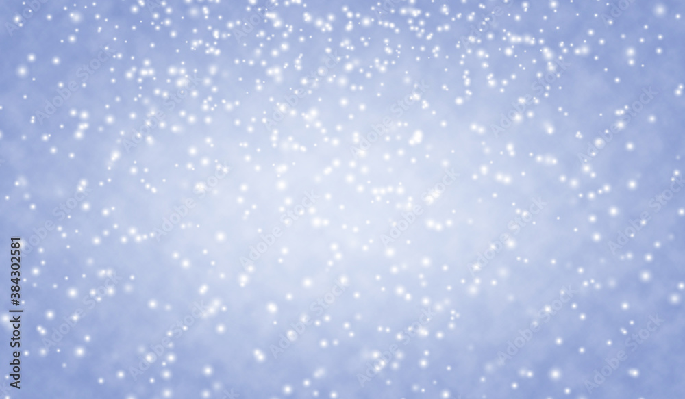 Beautiful blue Christmas background with falling snowflakes. Snowfall sky. Christmas and New Year winter background. 

