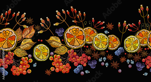 Embroidery lemon, mountain ash berries, cinnamon and carnation. Horizontal seamless pattern. Fashion autumn tea art. Template of clothes, tapestry, t-shirt design