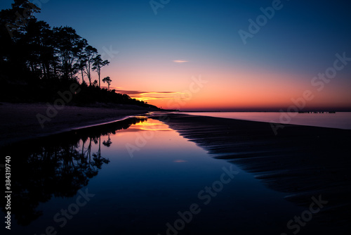 Ocean sunset sky - gorgeous panorama twilight sky and peaceful water background