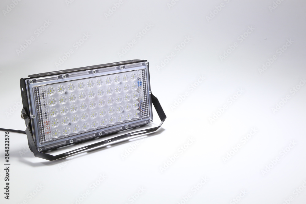 LED floodlight, outdoor light equipment. Isolated on white background. LED floodlight, outdoor light equipment. Isolated on white background.