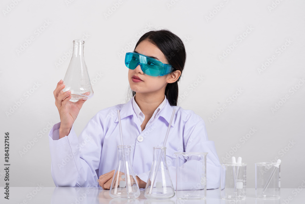 Asian women scientist with test tube making research in clinical laboratory, Science and chemistry concept, Medical technologist Asian women scientist with test tube making research in clinical laboratory, Science and chemistry concept, Medical technologist