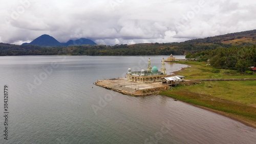 Aerial drone of Mosque on the shore of lake Lanao. Mindanao, Lanao del Sur, Philippines. photo
