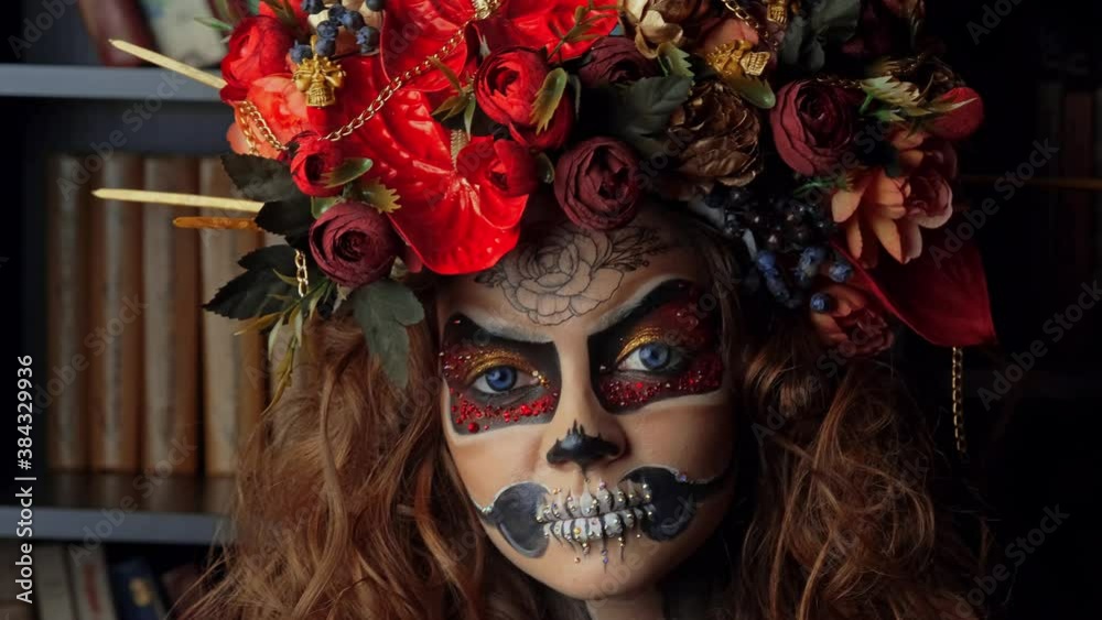 Close Up portrait of Calavera Catrina. Young beauty woman with sugar skull makeup