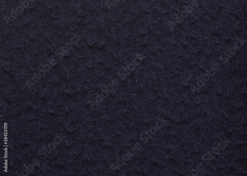 Dark blue fabric. Woll texture and fibers