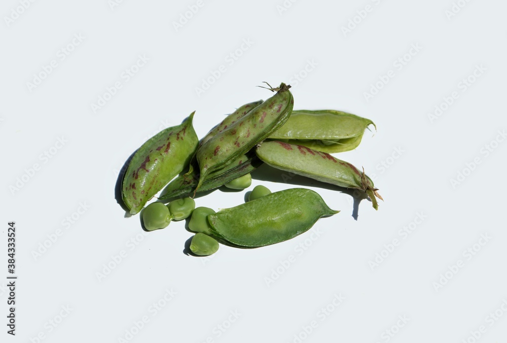 Raw Grass Pea Seeds or Chickling Vetch Pods Isolated on White Background Raw Grass Pea Seeds or Chickling Vetch Pods Isolated on White Background