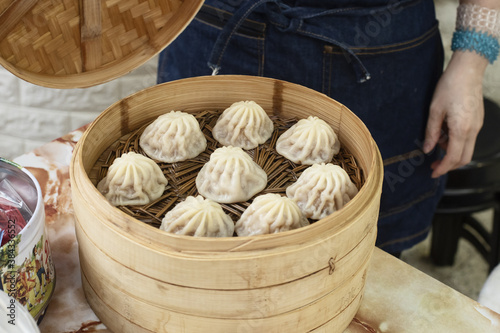 Quadro em tela dim sum in a bamboo basket in George Town, Penang, Malaysia.
