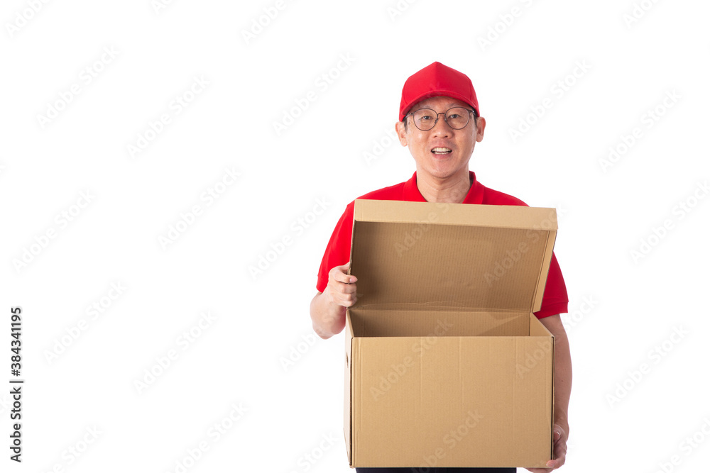 young Asian delivery man in red uniform, carry cardboard box in hands isolated on white background. young Asian delivery man in red uniform, carry cardboard box in hands isolated on white background.