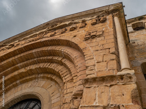 Lower view of the facade of a Romanesque church